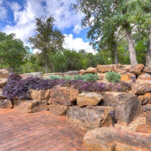 Edmond Oklahoma backyard boulder retaining wall service