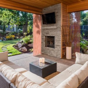 covered patio with fireplace