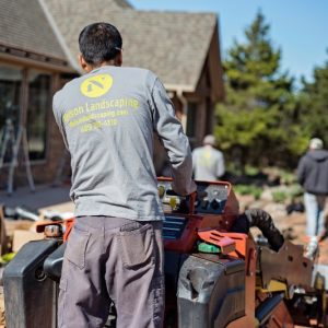 Men at work on Nelson landscaping backyard hardscaping project