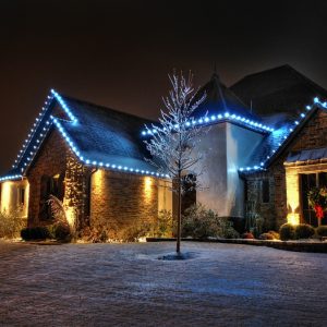 Blue colored Christmas lighting Service by Nelson Landscaping