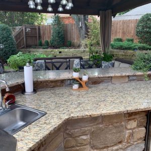 Nelson Landscaping Custom Outdoor Stone Kitchen designed for The Magic Man Jeff Roberts from KMGL radio