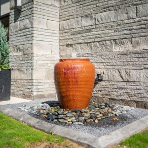 Front Yard Water Feature with modern home landscaping