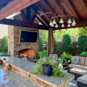 Outdoor fireplace, grill, TV, Lighting with seating