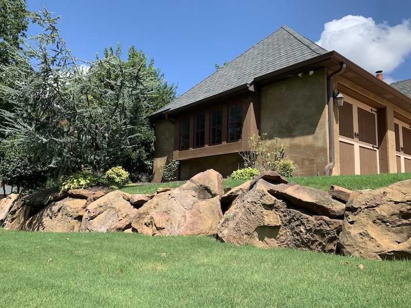 Boulder retaining wall in OKC by Nelson Landscaping